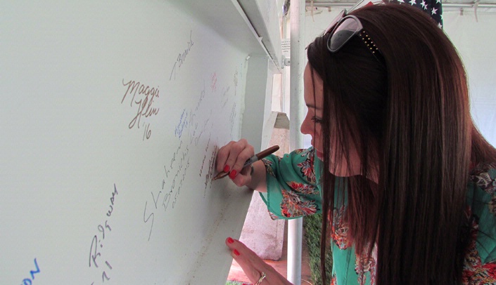 Image with caption: She graduated Saturday, but College of Pharmacy student Stephanie Wetovick left her mark on the new Lozier Center for Pharmacy Sciences and Education/UNMC Center for Drug Discovery.