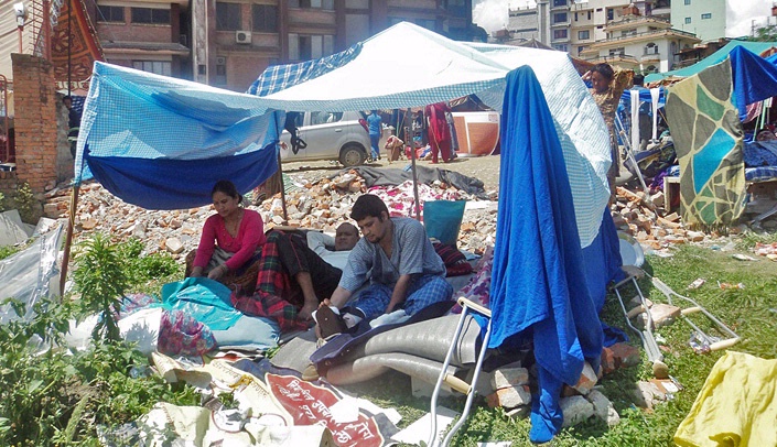 Image with caption: The earthquake has left many families without homes.