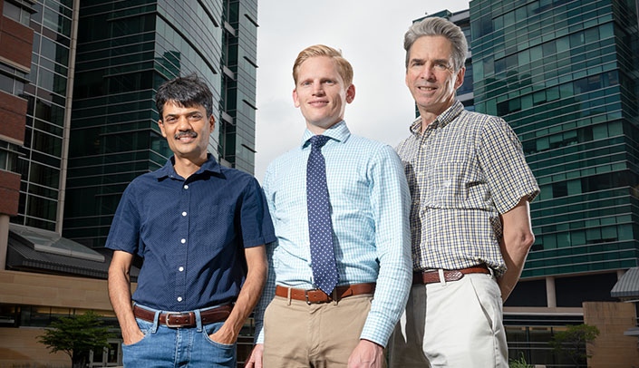 Image with caption: From left, Channabasavaiah (Guru) Gurumurthy, Ph.D., Justin Grassmeyer, Ph.D., and Wallace Thoreson, Ph.D.