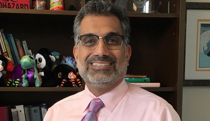 Dr. Khan joins 'Real Men Wear Pink' campaign | UNMC