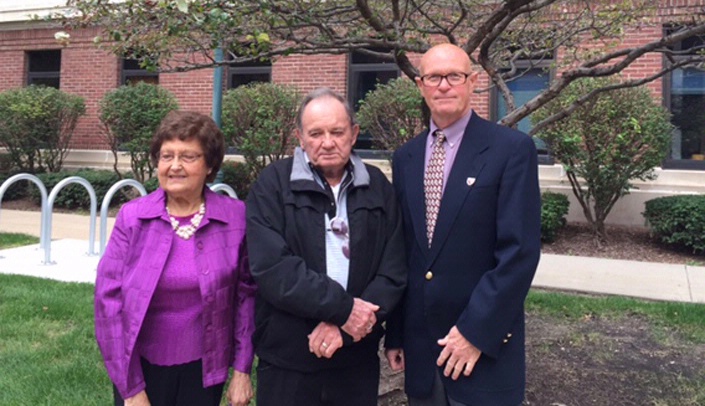 Image with caption: From left, Dawn Lisec's parents Darlene and Leonard with James Temme, associate director of the UNMC Department of Medical Imaging and Therapeutic Sciences.